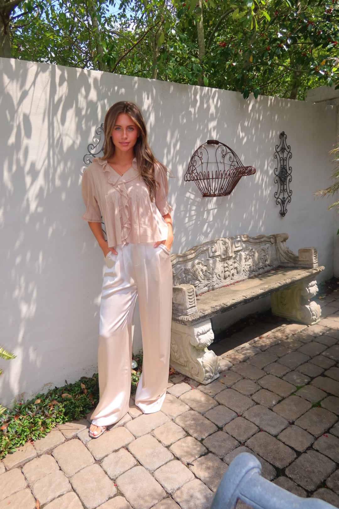 Ivory Ayla Satin Pant by Strawberry Paris with luxe satin fabric and pockets.