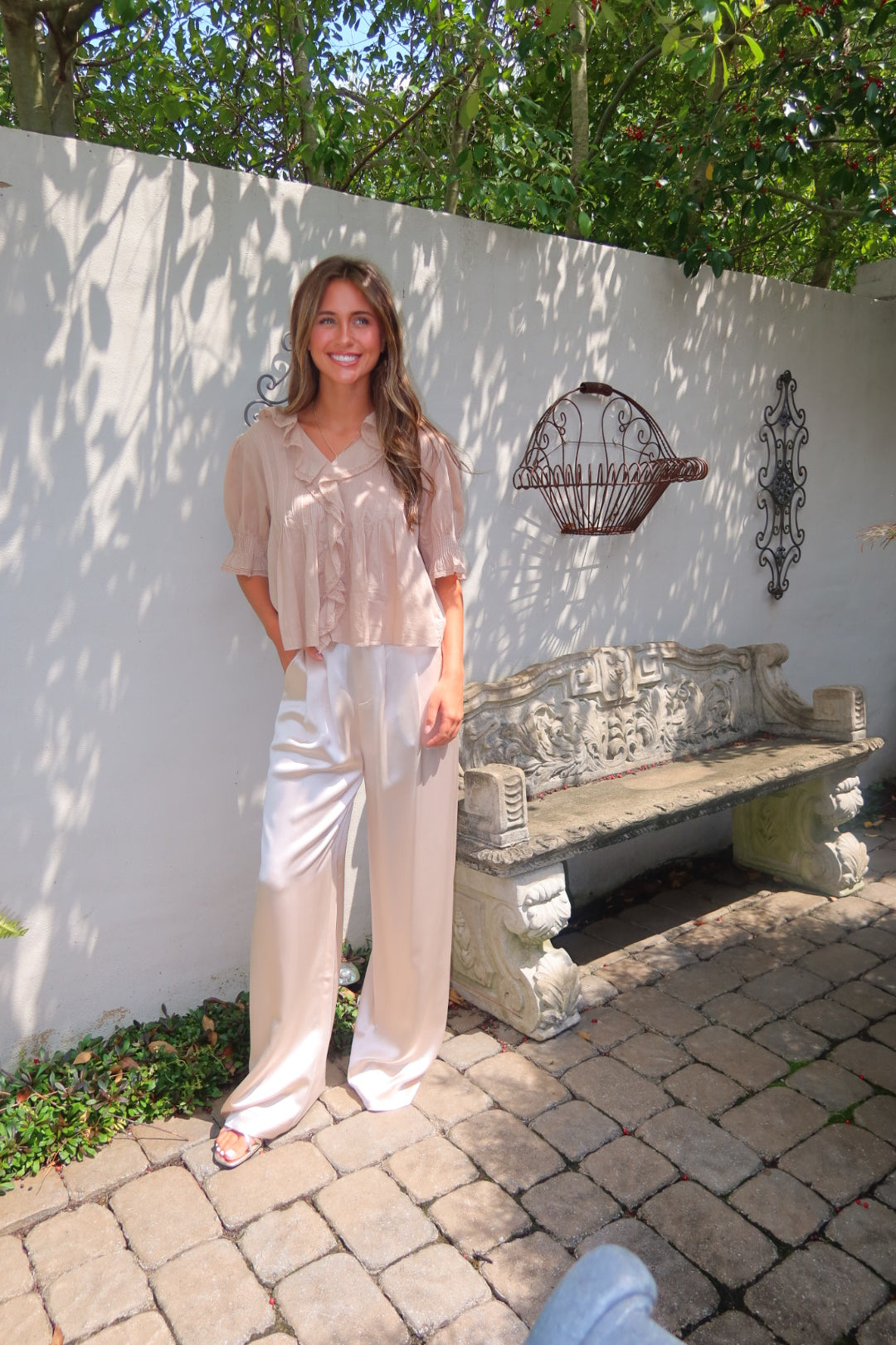 Ivory Ayla Satin Pant by Strawberry Paris with luxe satin fabric and pockets.