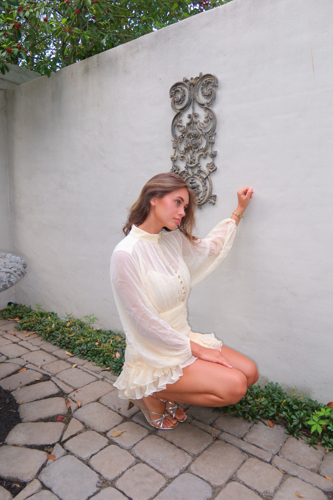 Cream pleated Kayal Dress by Strawberry Paris with button front and built-in cami.