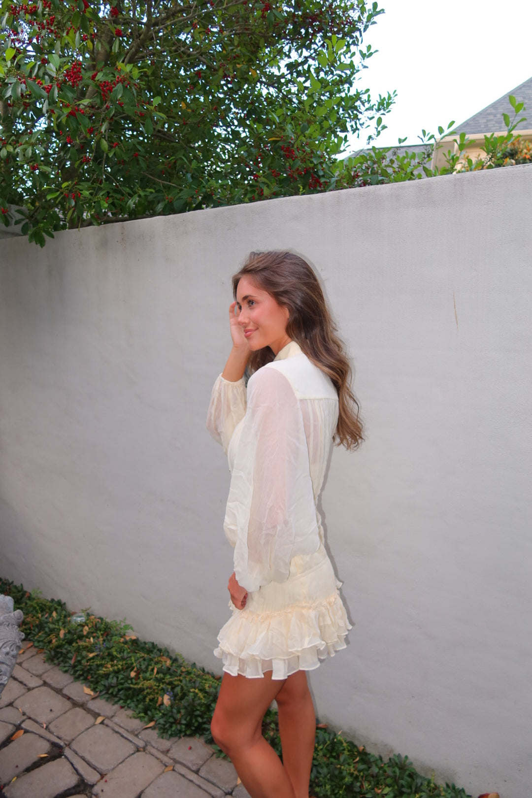 Cream pleated Kayal Dress by Strawberry Paris with button front and built-in cami.