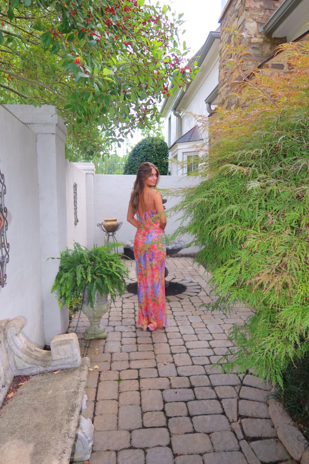 Valentina silk dress in Oily Flowers print by Strawberry Paris with pleated bodice and tie-back detail.