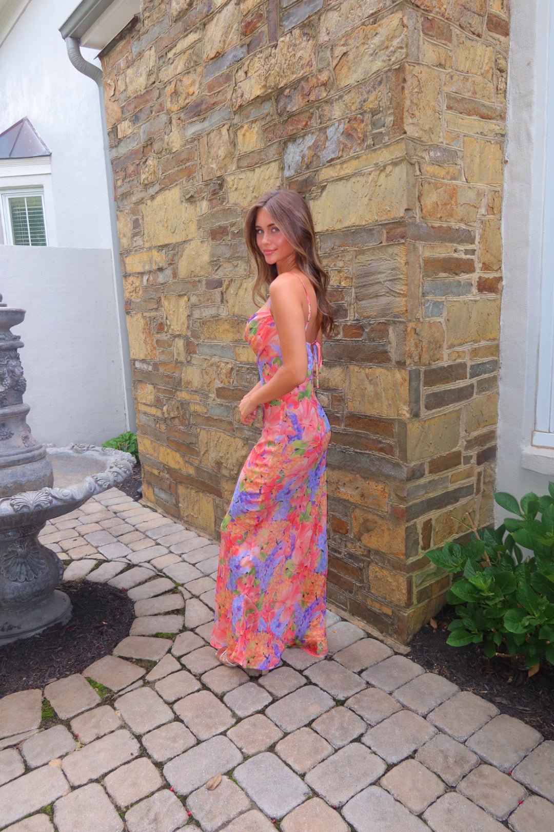 Valentina silk dress in Oily Flowers print by Strawberry Paris with pleated bodice and tie-back detail.