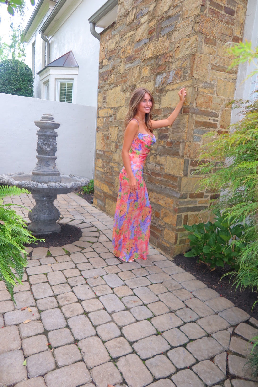 Valentina silk dress in Oily Flowers print by Strawberry Paris with pleated bodice and tie-back detail.